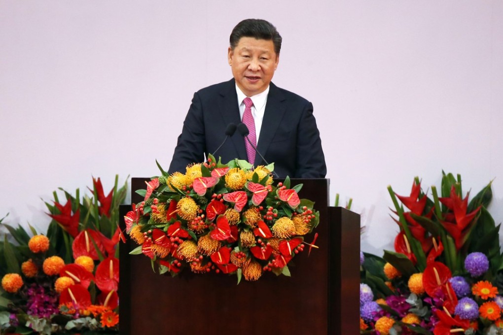 Xi Jinping addressed a crowd at the convention centre in Wan Chai. Photo: Sam Tsang