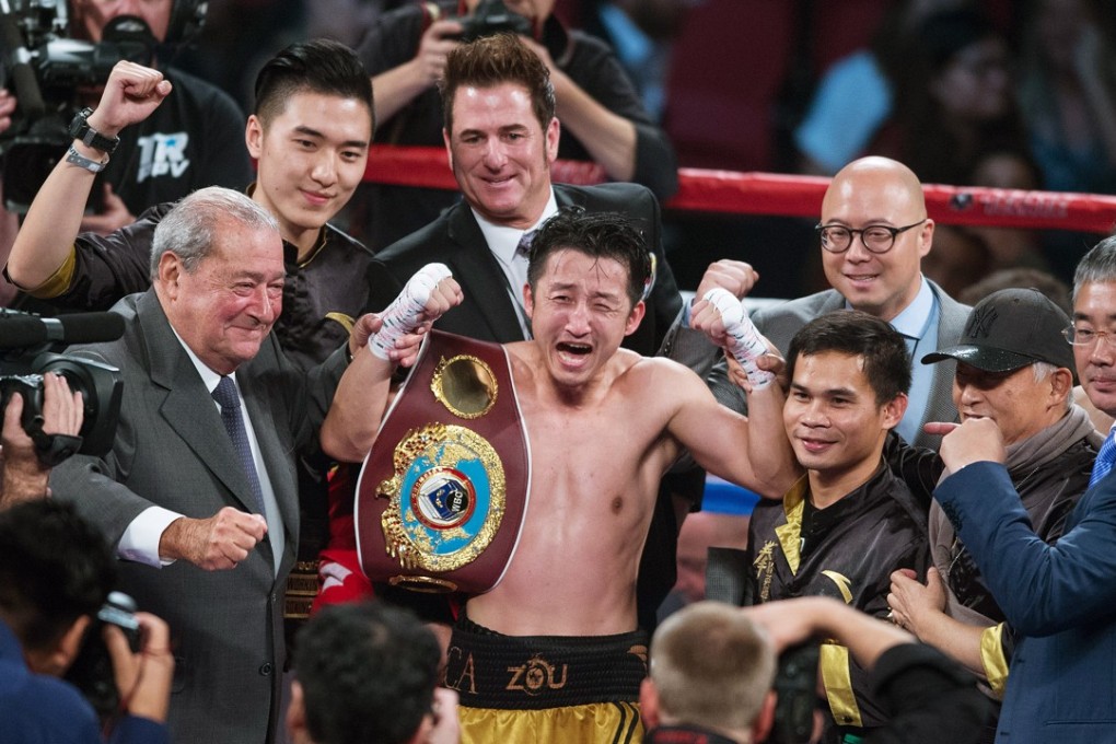 Zou Shiming celebrates his victory over Thailand’s Prasitak Phaprom to lift the WBO flyweight title in Las Vegas last November. Photo: Xinhua