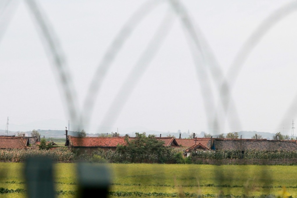 North Korean houses are pictured from Dandong, a Chinese city on the border with its reclusive neighbour. North Korean refugee women are often trafficked as soon as they cross into China. Photo: Handout