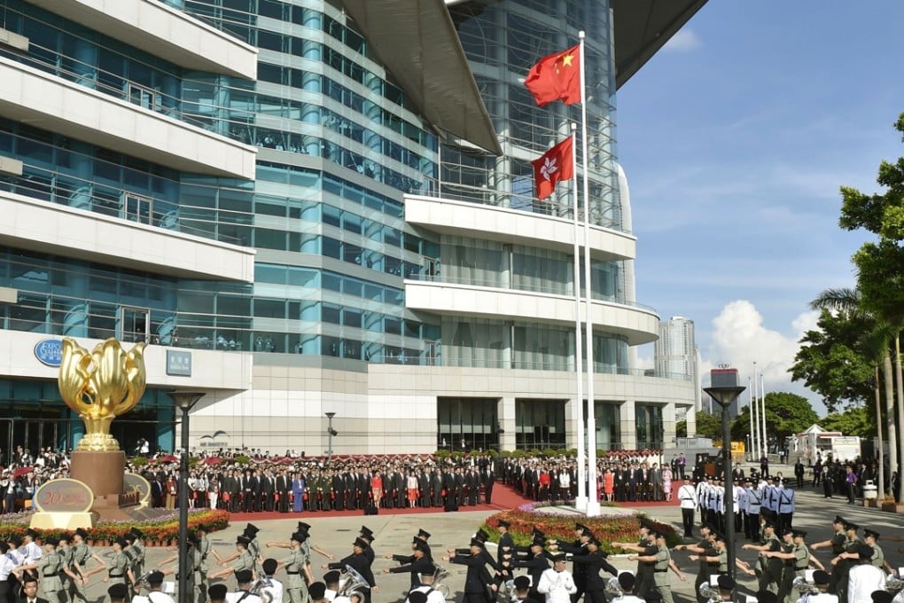 A flag-raising ceremony is held in Hong Kong on July 1, 2017, to mark the 20th anniversary of its return to China. Photo: Kyodo