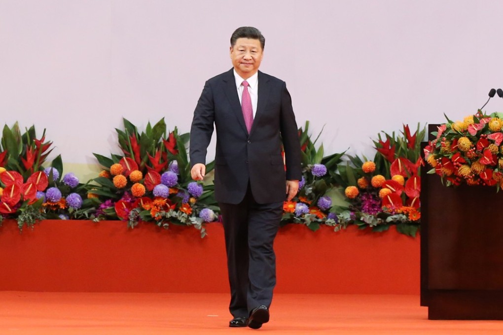 In the latter part of his speech, President Xi Jinping adopted a softer stance by calling on the public to solve problems through sensible communication instead of political confrontation. Photo: Sam Tsang