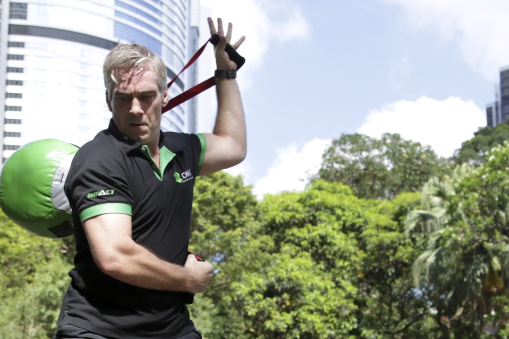 Personal coach Alex Poole, pictured working out in Hong Kong Park, says DNA testing is not a talent identification tool, but can help change the methods someone uses to get results faster. Photo: James Wendlinger