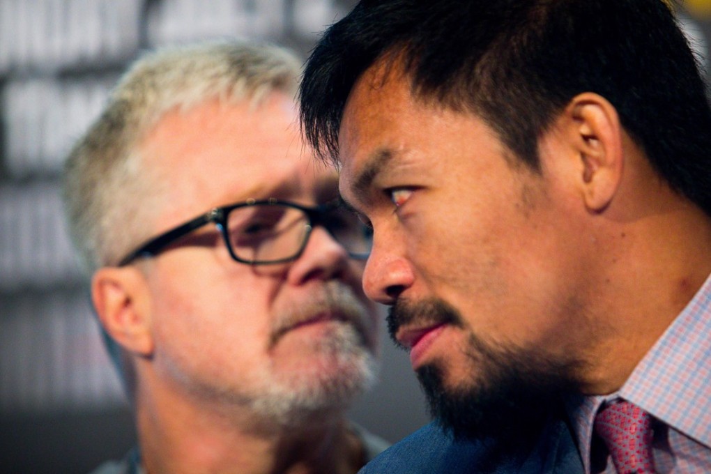 Trainer Freddie Roach says he will attempt to convince his charge, Philippine boxer Manny Pacquiao, to retire following his world title loss to Jeff Horn. Photo: AFP