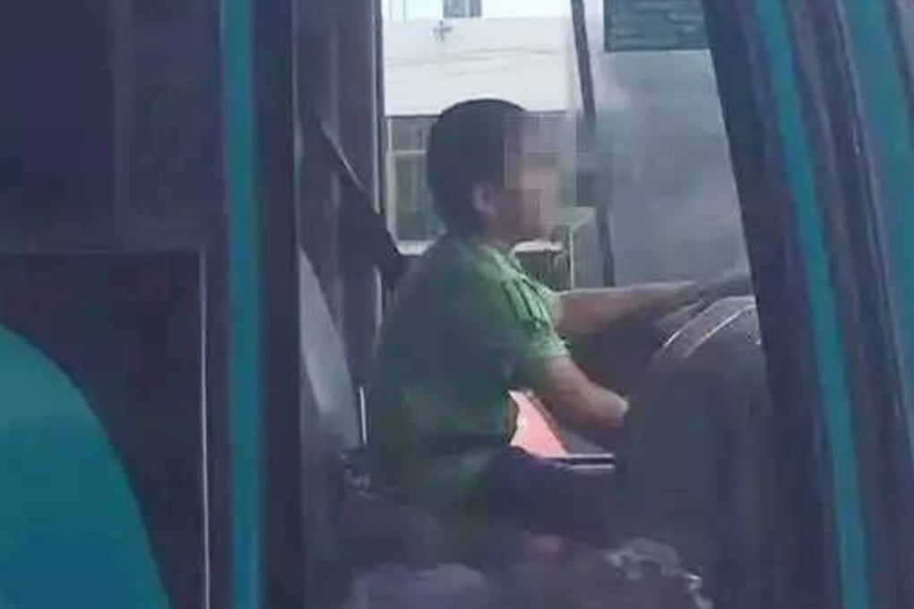 A 12-year-old boy is seen at the wheel of a bus he allegedly stole from a terminus and drove for 40 minutes through the streets of Guangzhou until being intercepted by police. Photo: Handout