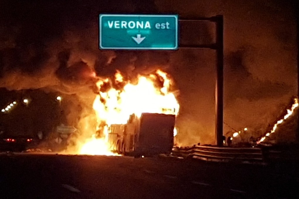 Flames engulf a bus that crashed near Verona, northern Italy - an accident that killed 16 in January this year. File photo: AP )