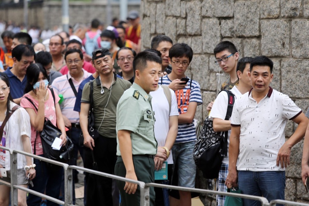 Many had been in line since Sunday night or early Monday morning. Photo: Dickson Lee