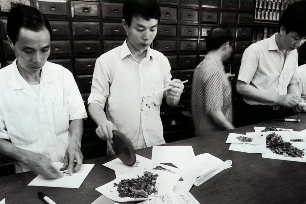 Staff at Eu Yan Sang’s Chinese medicine shop in Central dispensing Chinese herbs in the 1980s. The company now has 248 retail outlets and 34 clinics in Asia and further afield. Photo: SCMP