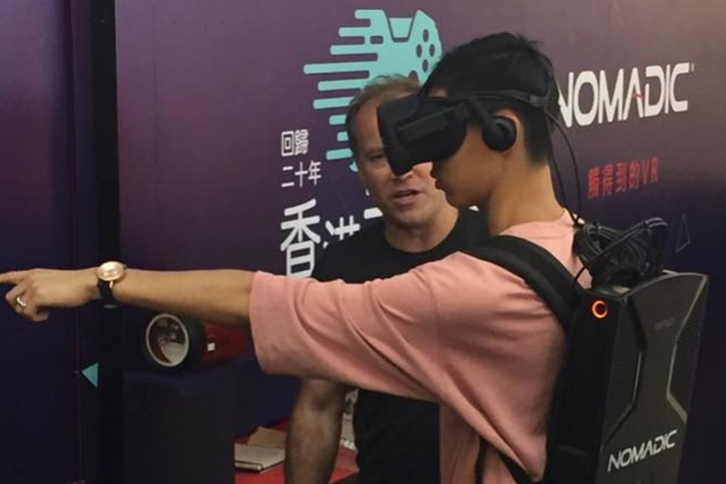 A player of Nomadic VR’s tactile virtual reality game at the Wonderful Worlds of Whampoa shopping mall in Hong Hom. Photo: SCMP/handout