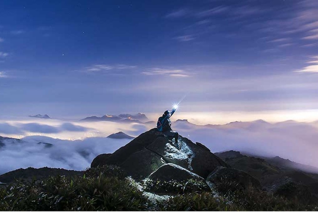 This stunning award-winning photo shows a woman near the top of Tai Mo Shan. Photo: Jessica Li