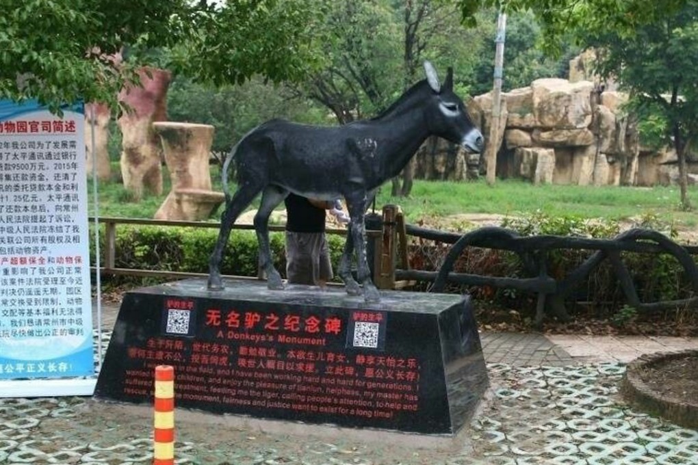 A memorial to the donkey eaten by tigers stands proud in a quiet corner of Yancheng Zoo. Photo: Handout