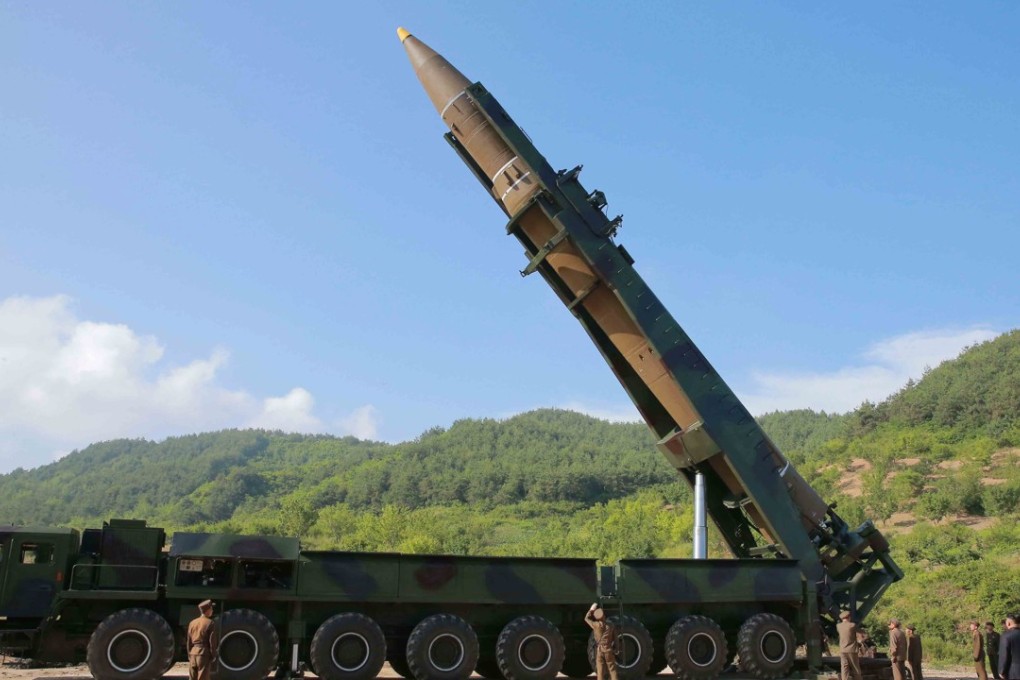 A handout photo made available by the official North Korean Central News Agency (KCNA) shows the North Korean inter-continental ballistic missile Hwasong-14 being prepared before a test launch. Photo: EPA