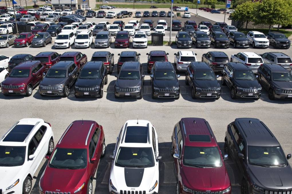 Fiat Chrysler Automobiles (FCA) Jeep vehicles are displayed for sale at a car dealership in Moline, Illinois. US auto sales were down for the sixth month running. Photo: Bloomberg