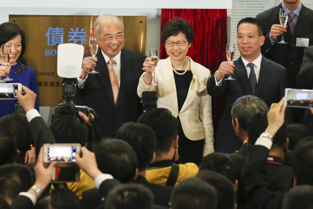 The official launch of the Bond Connect on Monday was attended by Chief Executive Carrie Lam Cheng Yuet-ngor (centre right, and chairman of Hong Kong Exchanges and Clearing Limited, Chow Chung-kong (centre left), among other dignitaries. Photo: Felix Wong