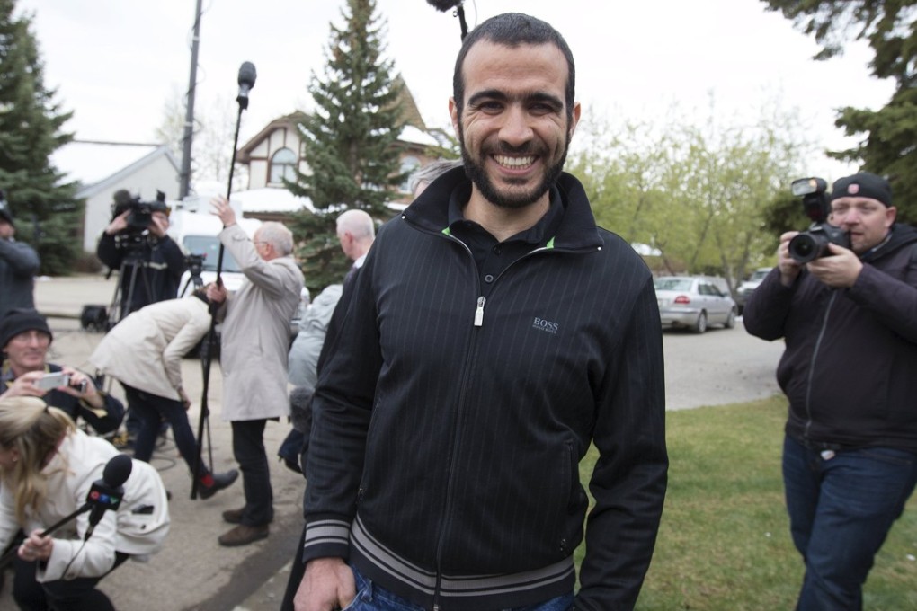 Omar Khadr leaves a news conference after being released on bail in Edmonton, Alberta, on May 7, 2015. Khadr, a Canadian, was once the youngest prisoner held on terror charges at Guantánamo Bay. Photo: Reuters