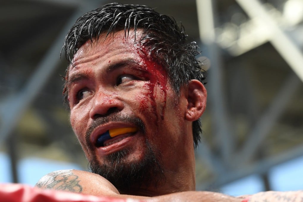 Manny Pacquiao reacts against Jeff Horn. Photos: EPA