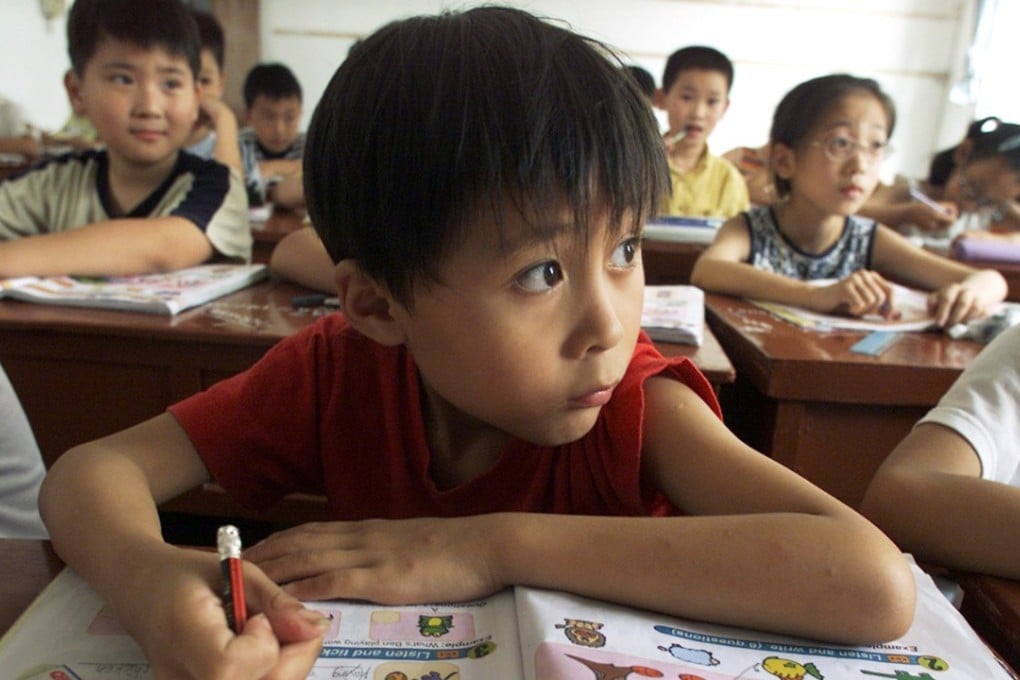 Sun Minyi listens in class in Chongming county, north of Shanghai. Photo: Reuters