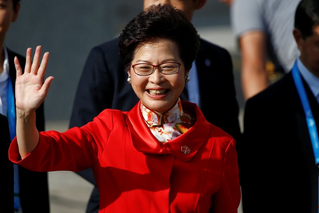 Hong Kong Chief Executive-elect Carrie Lam waves as she arrives for a flag raising ceremony on the 20th anniversary of the city's handover from British to Chinese rule, in Hong Kong. Photo: Reuters