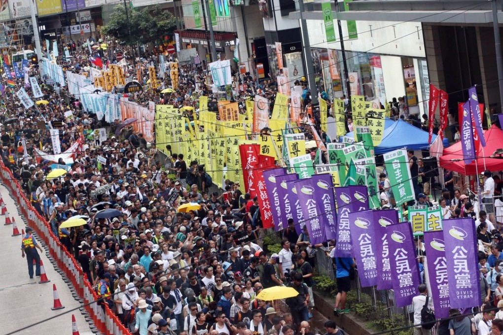 The July 1 march. The organiser said 60,000 people took part. Photo: David Wong