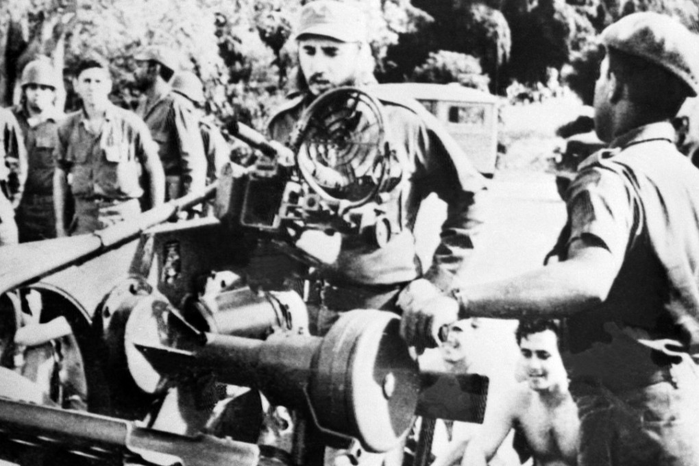 Cuban leader Fidel Castro (centre) inspects weapons at a military base on November 2, 1962, during the missile crisis. The crisis represented the closest point the world had come to nuclear warfare after the second world war. Photo: AFP