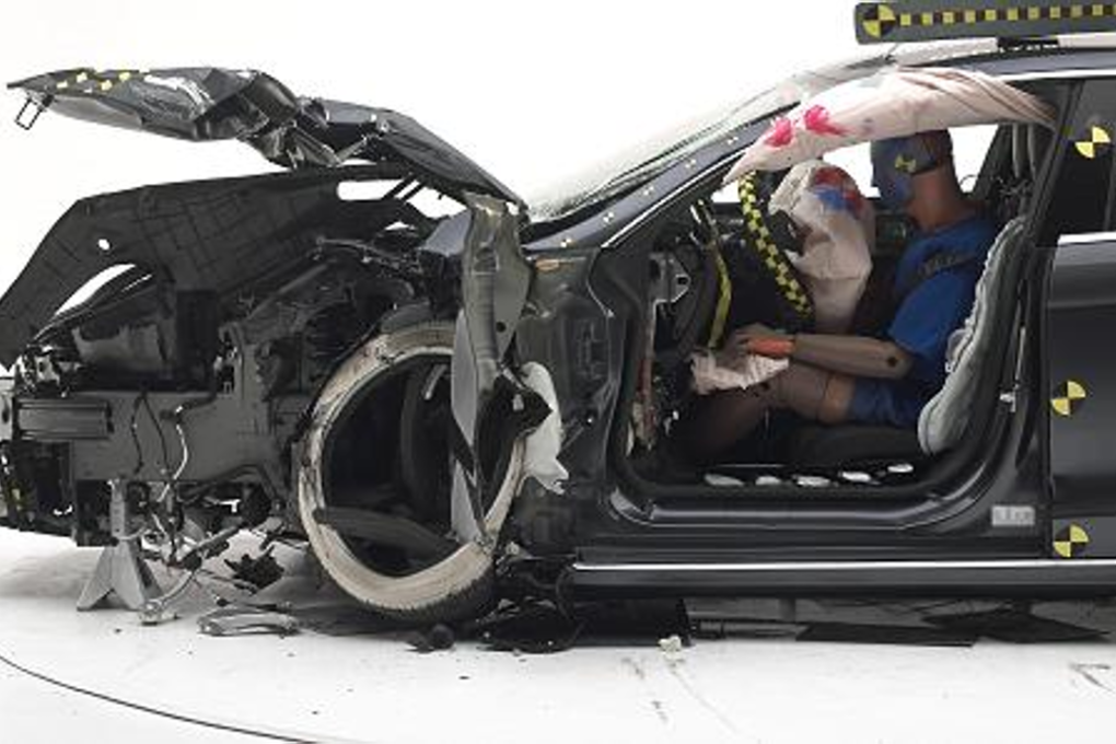 The dummy's position in relation to the door frame, steering wheel, and instrument panel after the second crash test indicates that the driver's survival space was maintained reasonably well overall. Photo: IIHS