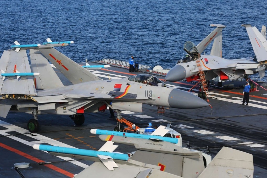 Jets on the deck of the aircraft carrier Liaoning. Photo: Xinhua
