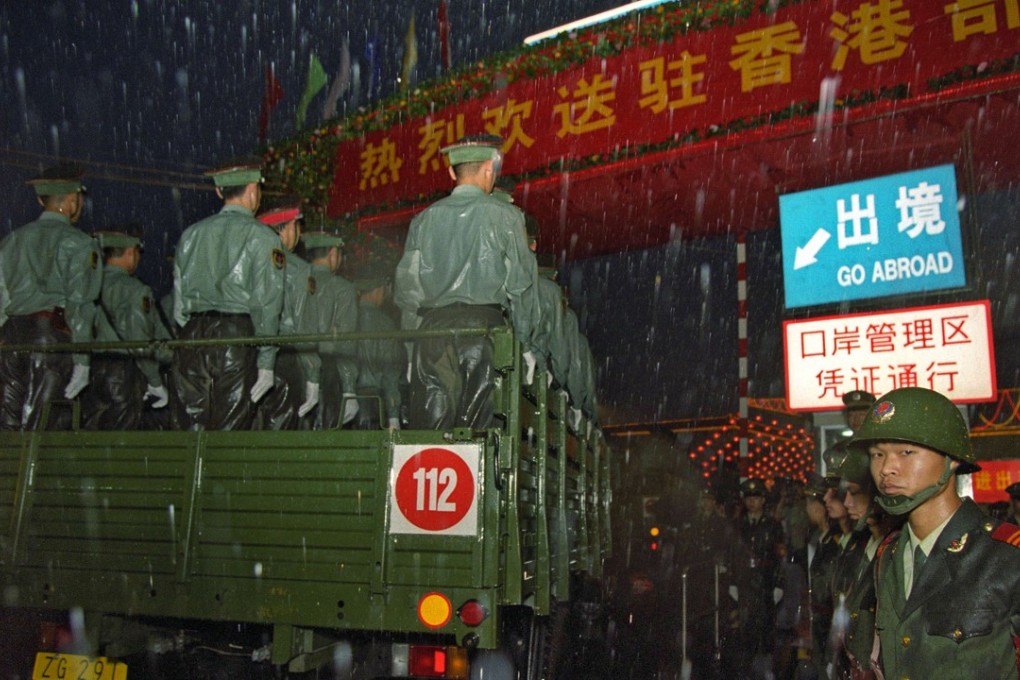 PLA convoys cross the border into Hong Kong on July 1, 1997. Picture: AFP