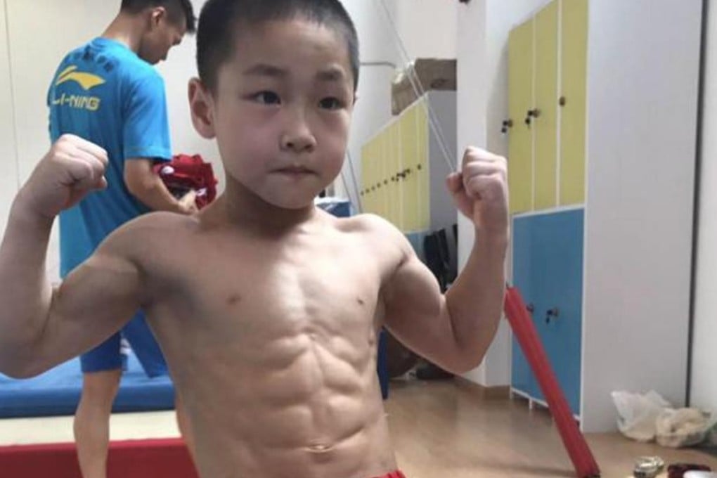 Chen Yi, seven, showing off his abs. Photo: Handout