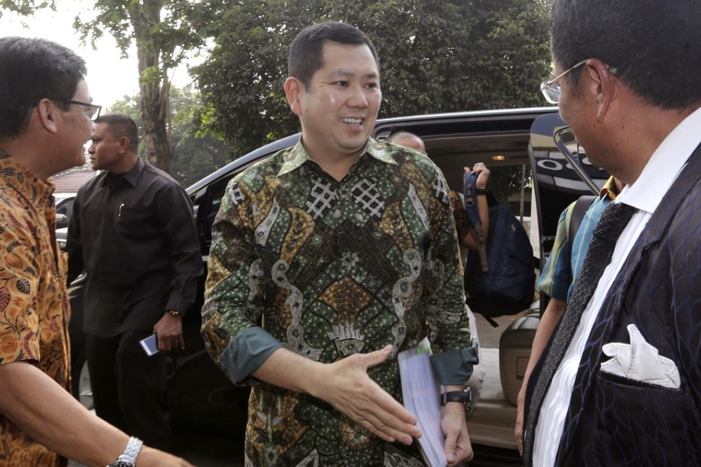 Hary Tanoesoedibjo arrives at the national police's Criminal Investigation Agency in central Jakarta, Indonesia, on Friday July 7, 2017. Photo: AP