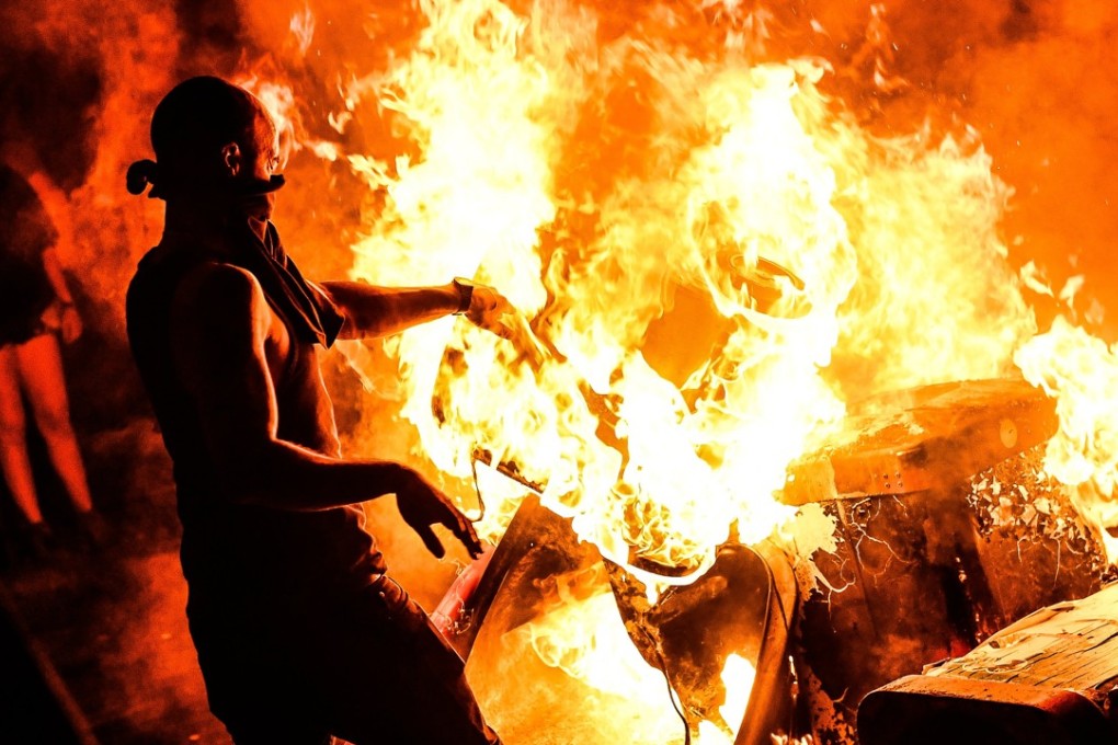 Protesters burn a barricade in Hamburg ahead of the G20 summit. Photo: EPA