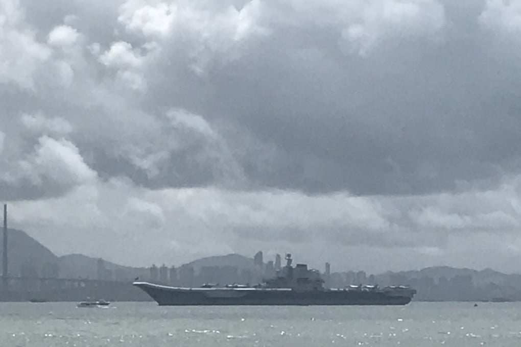 The Liaoning is visible from Disney Resort Pier. Photo: Tracy Zhang