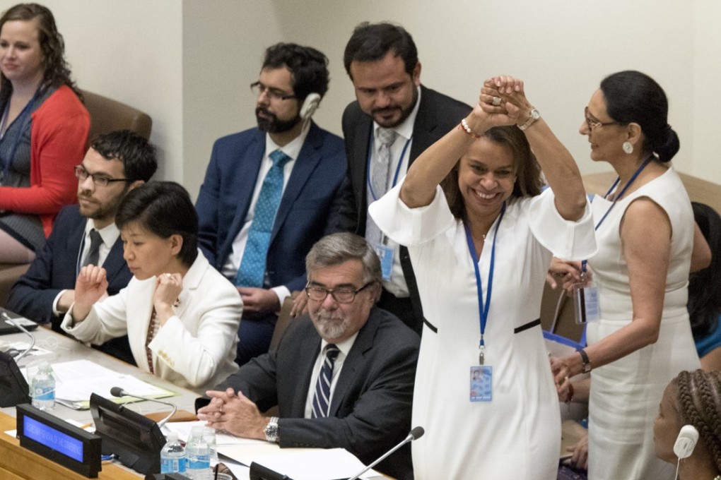 Costa Rican Ambassador Elayne Whyte Gomez celebrates the result. Photo: AP