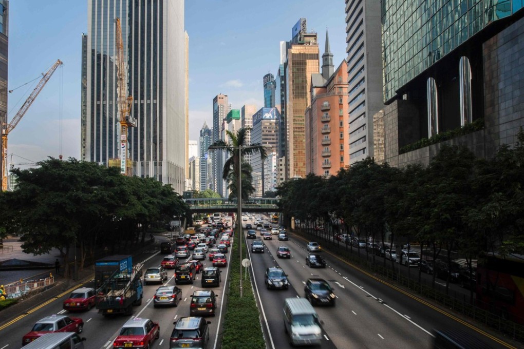 Hong Kong’s traffic congestion could be eased with innovative car pooling systems. Photo: AFP Photo/ Isaac Lawrence