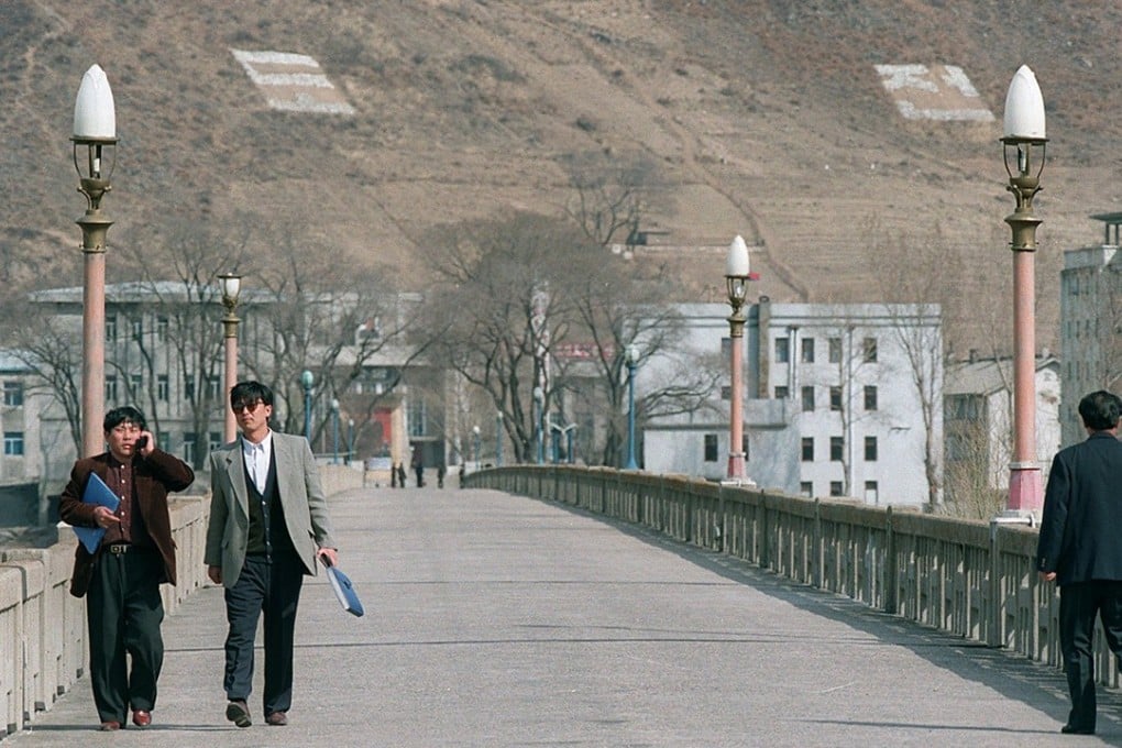 Many traders and businesses along the China-North Korea border, including at the Tumen Gate Bridge, above, fear more strict sanctions from China could mean the end of their livelihoods. Handout photo