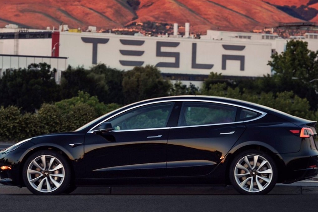 The first Tesla Model 3 to roll off the production line, in a photo tweeted Sunday by Tesla CEO Elon Musk. Photo: Twitter /@ElonMusk