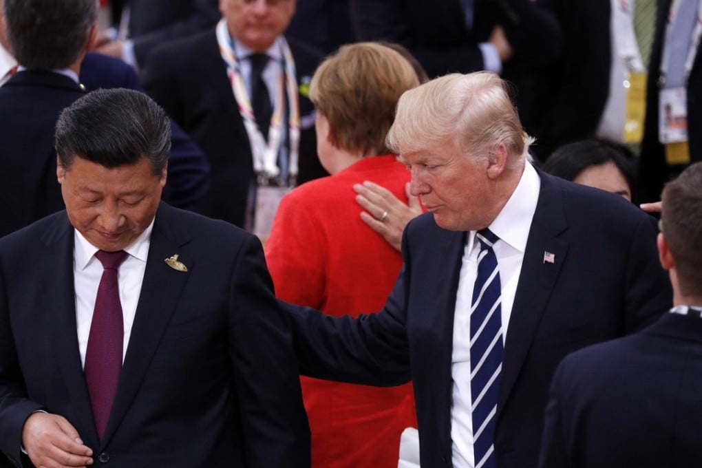 US President Donald Trump has a word with President Xi Jinping at the start of the first working session of the G20 meeting in Hamburg on July 7. The biggest flashpoint in US relations with a rising China is without question North Korea. Photo: AFP