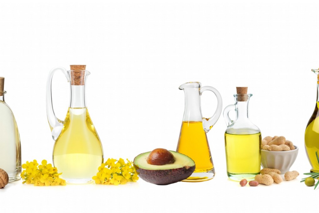 Cooking oils such as (from left) walnut, canola, avocado, peanut and olive contain all kinds of beneficial essential vitamins and acids. Photo: Alamy