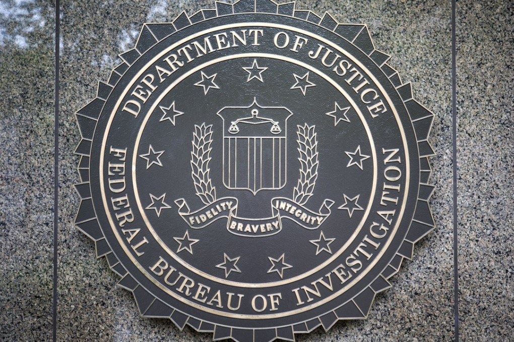 The seal of the Federal Bureau Of Investigation (FBI), the domestic intelligence and security service of the United States, at the facade of the J. Edgar Hoover FBI Building, in Washington, DC, USA. Photo: EPA/JIM LO SCALZO