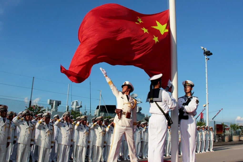 A flag-raising ceremony at the PLA garrison in Hong Kong to celebrate the 20th anniversary of the city's return to Chinese rule. Photo: Xinhua