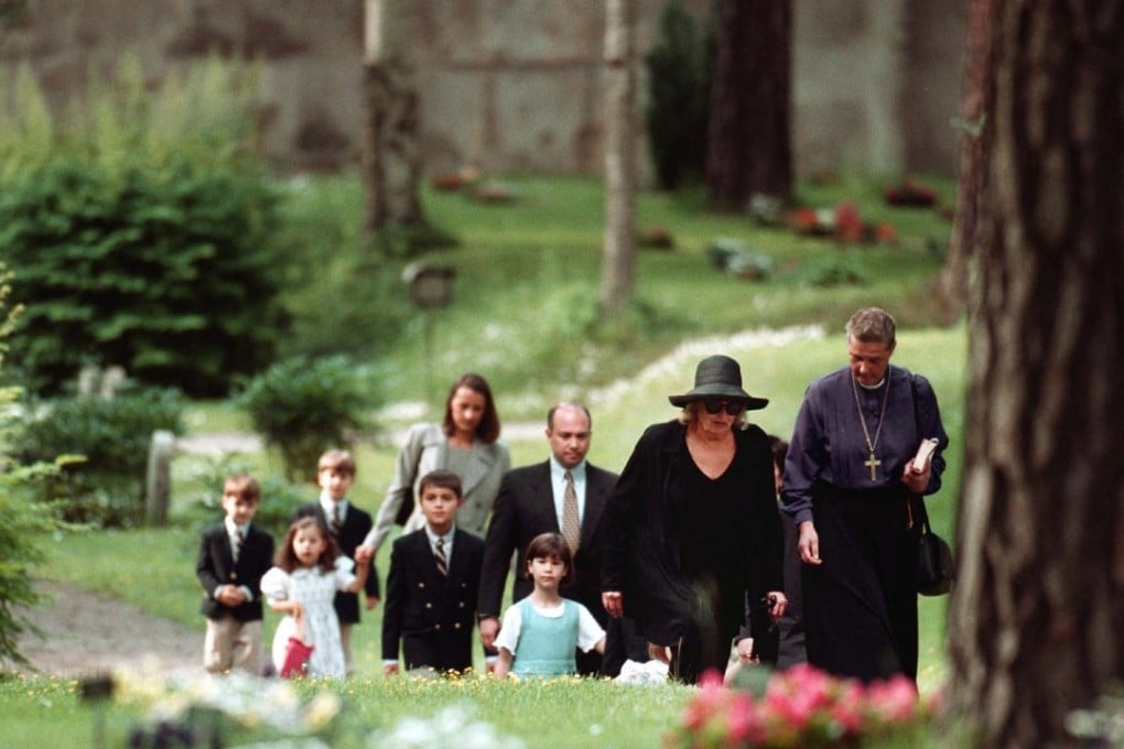 Caroline Krook, Bishop of Stockholm, leads the procession through the Woodland Cemetery in Stockholm, Sweden, Wednesday June 16 1999, with the urn containing the ashes of Greta Garbo. Krook is followed by Gray Reisfield, niece and sole heir of the 1930-era film star. Photo: AP