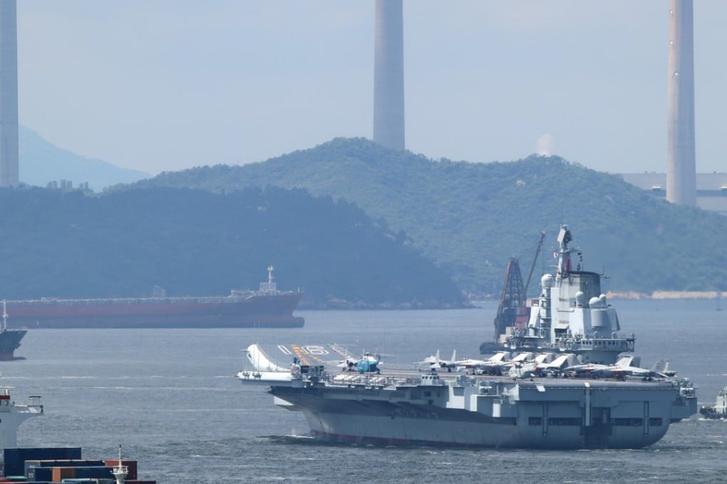 The Liaoning leaves Victoria Harbour. Photo: Roy Issa