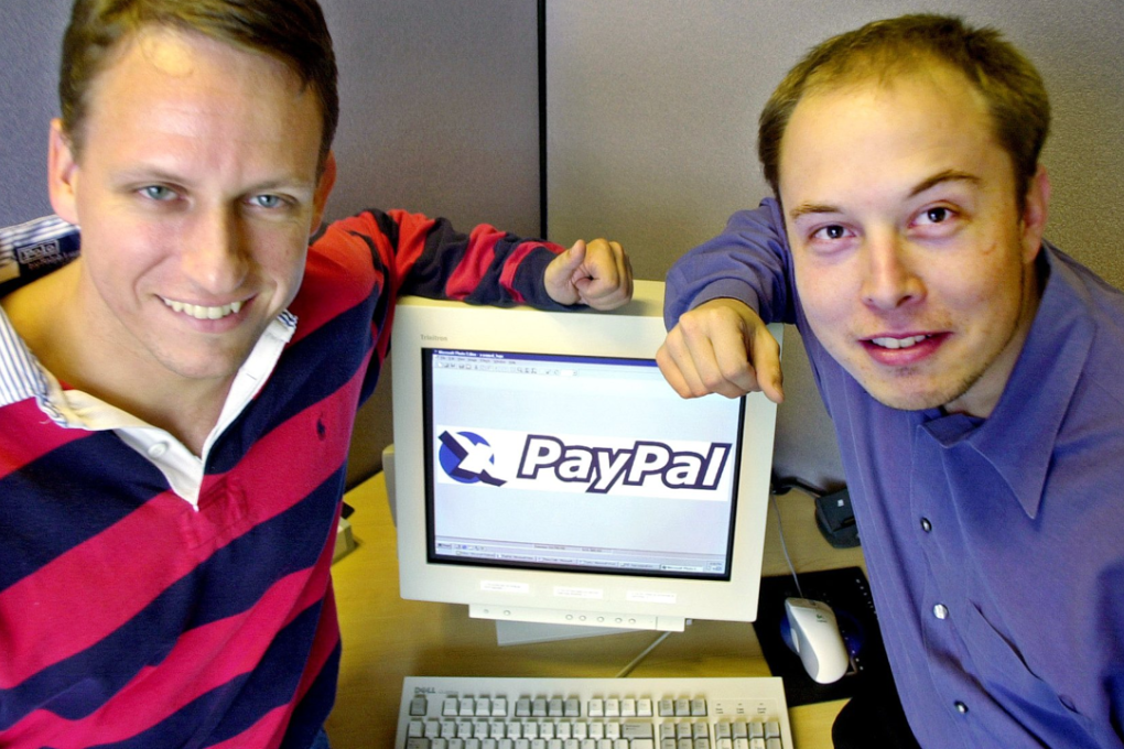 Peter Thiel (left) and Elon Musk (right) during the early days of PayPal. Photo: AP