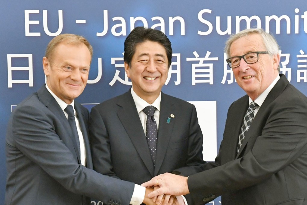 Japanese Prime Minister Shinzo Abe with European Council President Donald Tusk (left) and Jean-Claude Junker, president of the European Commission, before talks in Brussels on July 6. Japan and the European Union later announced a broad agreement on a free trade deal. Photo: Kyodo
