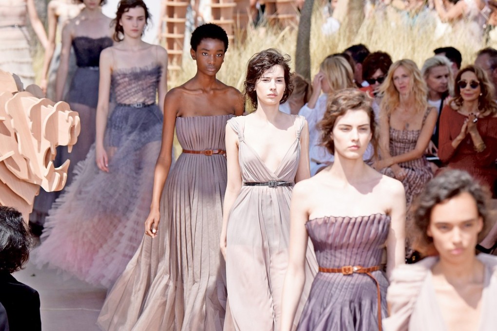 Models present Christian Dior creations during the haute couture autumn/winter 2017/18 collection shows in Paris. Photo: Xinhua