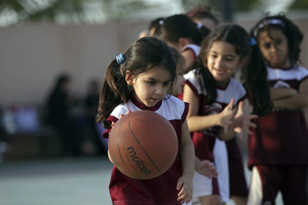 Saudi and expatriate girls practice basketball at a private sports club in Jiddah, Saudi Arabia. Saudi Arabia's Education Ministry said on Tuesday July 11, 2017, it will introduce physical education classes for girls in public schools next year, a decision that comes after years of calls by women across the kingdom demanding greater rights and greater access to sports. Photo: AP