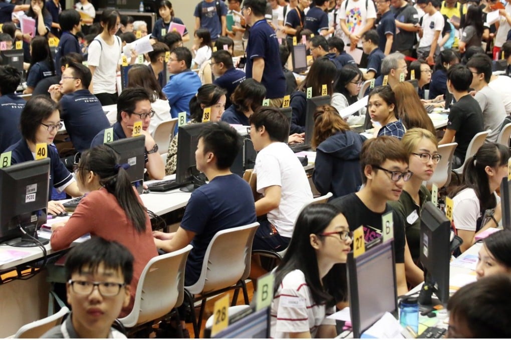 DSE students applying for self-financing degrees in Cheung Sha Wan on Wednesday. Photo: K. Y. Cheng