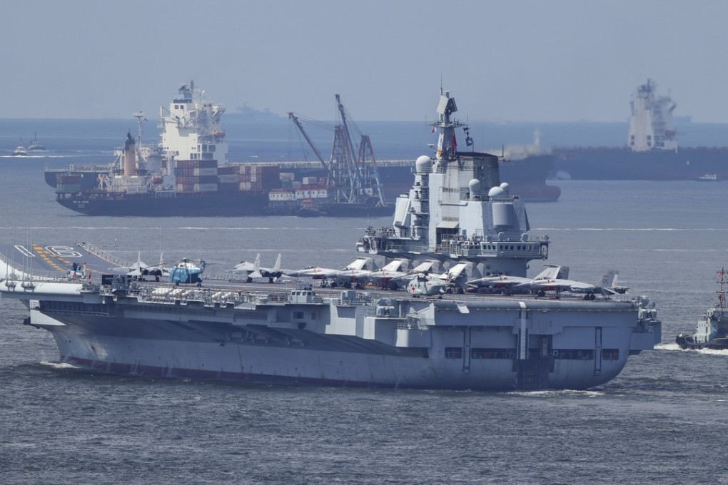The Liaoning pictured leaving Hong Kong waters on Tuesday. Photo: Roy Issa