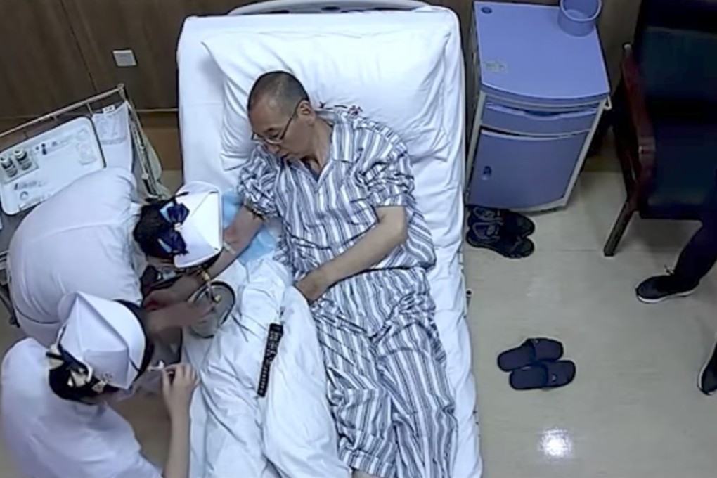 Nobel Peace Prize winner Liu Xiaobo is treated by a medical team in footage posted online late last month. Photo: Handout