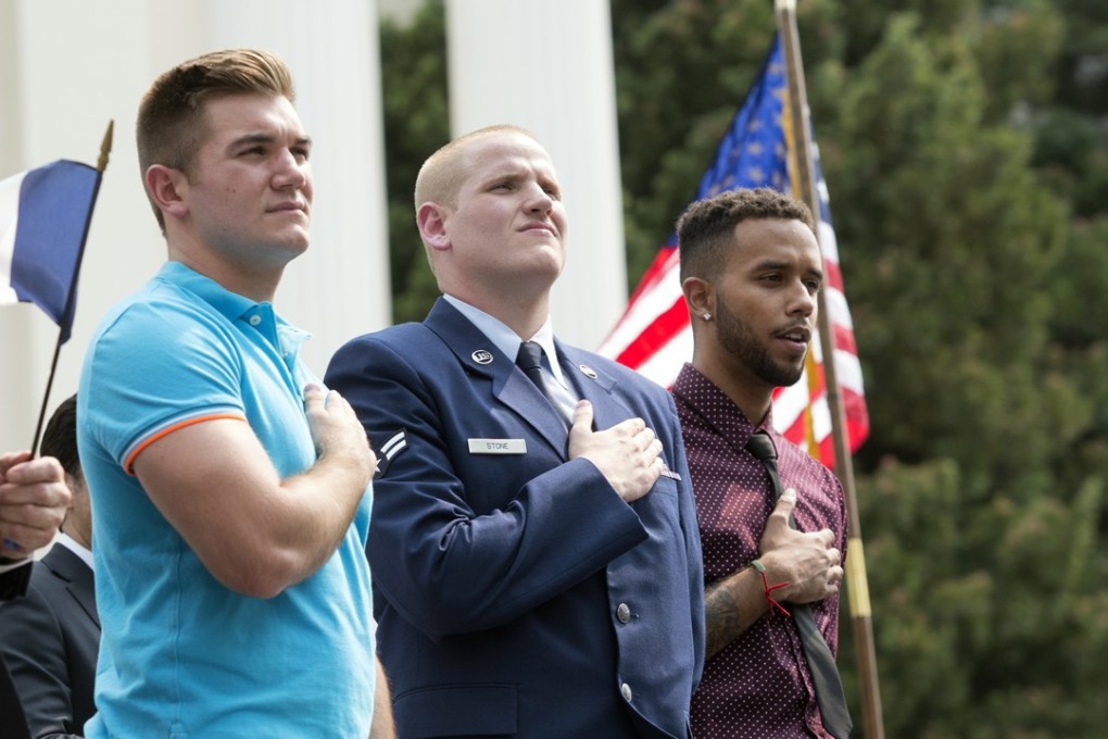 In this September 11, 2015 file photo, Oregon National Guardsman Alek Skarlatos, left, US Airman Spencer Stone, centre, and Anthony Sadler attend a Sacramento parade held in their honour, after they thwarted a terror attack on a French train. Photo: AP