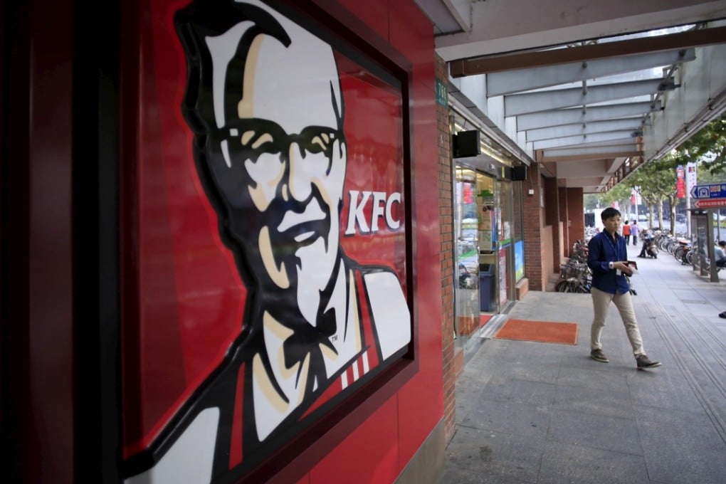 A customer walks out of a KFC restaurant in Shanghai, China. Photo: REUTERS/Aly Song