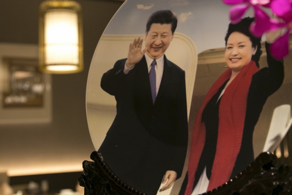 A painted plate featuring Chinese President Xi Jinping and first lady Peng Liyuan adds a quirky touch to the elegant decor at Lao Xue Yuan in Wan Chai. Photo: James Wendlinger